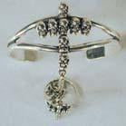 CROSS OF SKULLS CUFF SLAVE BRACELET WITH RING ON CHAIN
