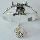 HORNED SKULL WITH CROSSBONES SLAVE BRACELET WITH RING ON CHIAN