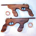ANTIQUE LOOKING MACHINE GUN ELASTIC SHOOTER
