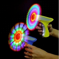 SPINNING  WINDMILL LIGHT UP PISTOL ( sold by the piece)